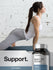 Woman doing yoga with Beta 1,3D Glucan supplement bottle in foreground.