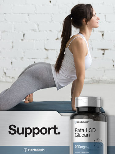 Woman doing yoga with Beta 1,3D Glucan supplement bottle in foreground.