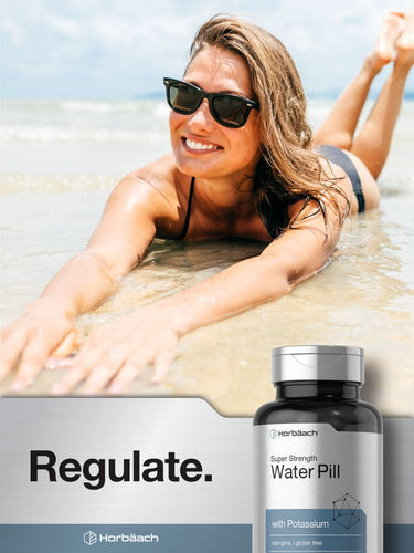 Woman relaxing on a beach with a bottle of water pill in the foreground.