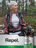 Woman hiking with a backpack in a forest, Horbaach Repel Lemon Eucalyptus essential oil bottle visible