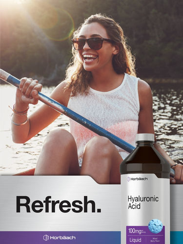 Woman paddling a kayak with a bottle of Horbaach Hyaluronic Acid supplement in the foreground.