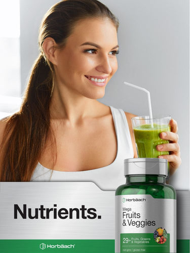 View 7 Woman holding a green smoothie with a bottle of supplements labeled 'Mega Fruits & Veggies'.