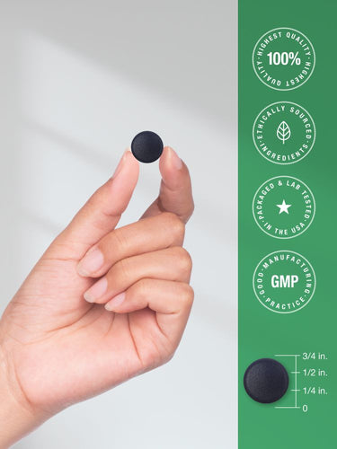 View 7 Hand holding a black tablet with product details on a green background