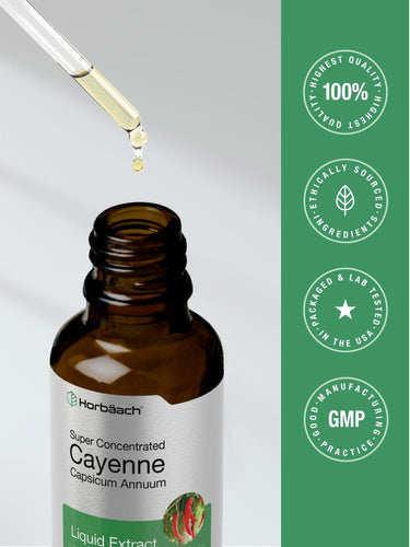 Bottle of Super Concentrated Cayenne Liquid Extract with dropper on a gray background