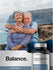 Couple embracing on a scenic background with a bottle of Horbaach Coral Calcium + Magnesium supplement.