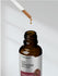 Bottle of Horbaach Super Yohimbe Max 2300 Liquid Extract with dropper on a light gray background