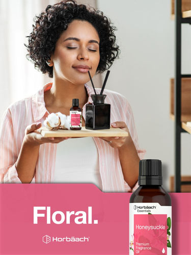 Woman holding a tray with diffusers and bottles, with 'Floral' and Horbaach branding.