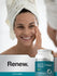 Woman with a towel on her head smiling next to a bottle of Hertäsch Marine Collagen Peptides.