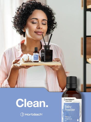 View 7 Woman holding a tray with fragrance products, featuring Hortbaech brand on a blue banner.