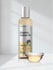 Bottle of Organic Castor Oil with a dropper on a light gray background