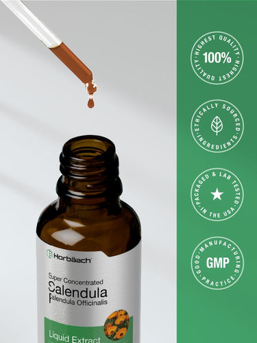 Bottle of calendula liquid extract with dropper and certification logos.