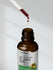 view 7 Brown bottle of St. John's Wort liquid extract with dropper on gray background