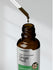 view 7 Bottle of ginger root liquid extract with dropper on a plain background