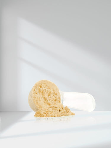 Spherical yellow object on a white background