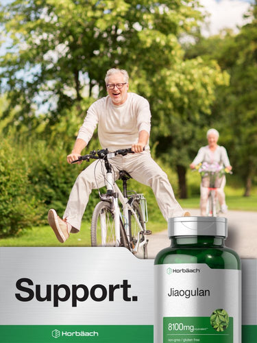 View 7 Senior man riding a bicycle with a bottle of Jiaogulan supplement in the foreground.