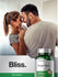 Bottle of Ginger Root supplement with a couple embracing in the background, branded 'Bliss'.