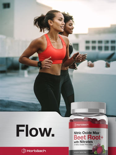 View 7 Two women running with a bottle of Beet Root with Nitrates supplement in the foreground.