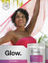 view 7 Woman in pink top with 'Glow' text and skin rejuvenation product bottle.