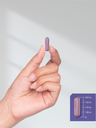 View 7 Hand holding a purple cylindrical object with size measurement inset.