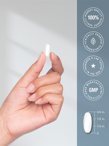Hand holding a white pill with certification icons on a light gray background