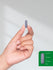 view 11 Hand holding a small cylindrical object with a measurement inset on a plain background.