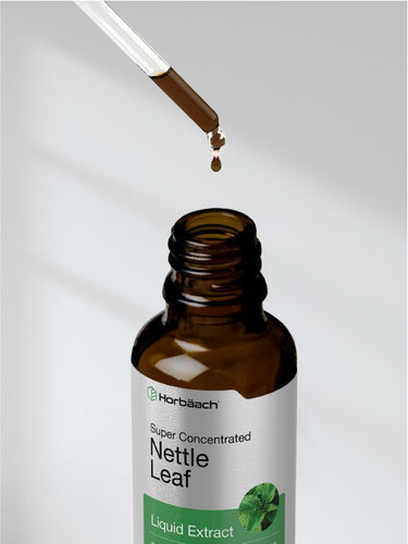View 8 Bottle of Herbatach Nettle Leaf Liquid Extract with dropper on a light gray background