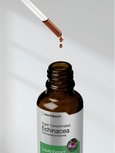 View 8 Brown bottle of echinacea liquid extract with dropper on a light background