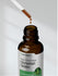 Bottle of Horbaach Super Concentrated Horsetail Grass Liquid Extract with dropper on a white background