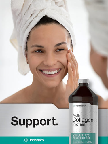 View 6 Smiling woman with a towel on her head touches her cheek near a Horbaach Multi Collagen Protein bottle.