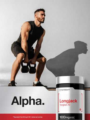 View 6 A man exercises with kettlebells next to a Longjack bottle.