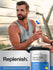Man holding a water bottle with a supplement container labeled 'Replenish' and 'Electrolyte Powder'.