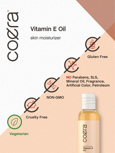 View 12 Coera Vitamin E Oil bottle with icons indicating Gluten Free, No Parabens, SLS, Mineral Oil, Fragrance, Artificial Color, Petroleum, NON-GMO, Cruelty Free, and Vegetarian.