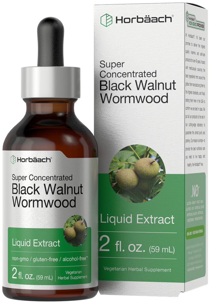 Hand holding a bottle of Super Concentrated Black Walnut Wormwood Liquid Extract, 2 fl. oz. (59 mL) for scale.