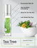 Tea tree essential oil roll-on with a mortar and pestle and tea tree leaves on a light gray background.