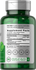 Green supplement bottle with label showing supplement facts.