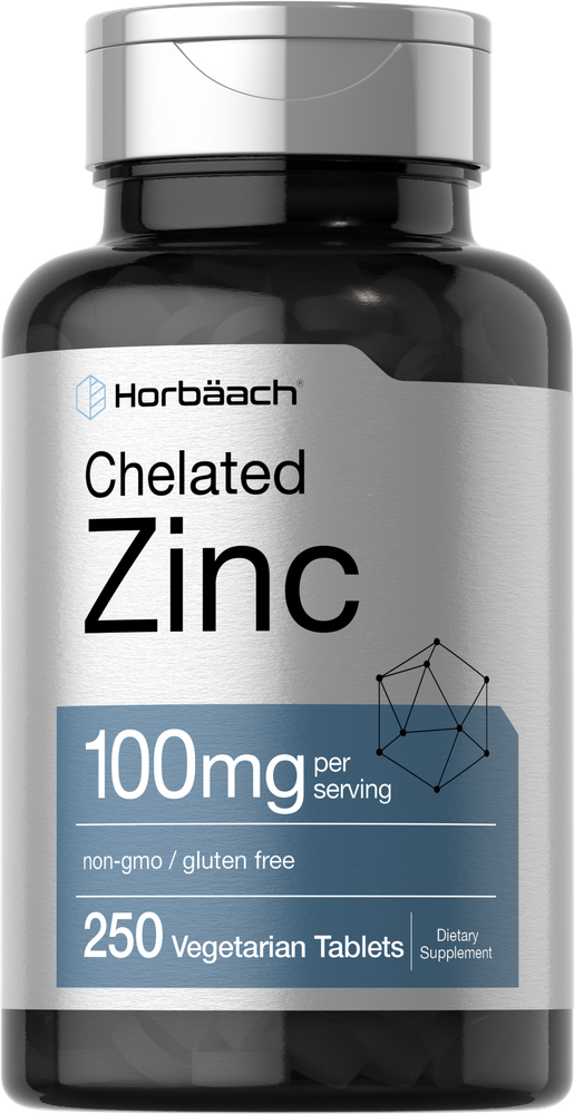 Hand holding a scale weighing 250 vegetarian tablets, each 100mg per serving, emphasizing product quantity and dosage.