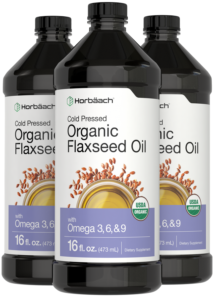Three bottles of Horbäach Cold Pressed Organic Flaxseed Oil, each 16 fl. oz. (473 mL).